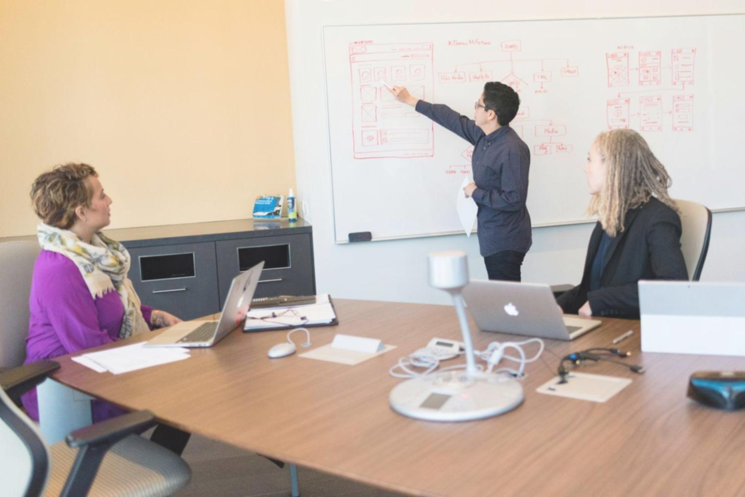 Business professional analyzing financial dashboard on computer screen