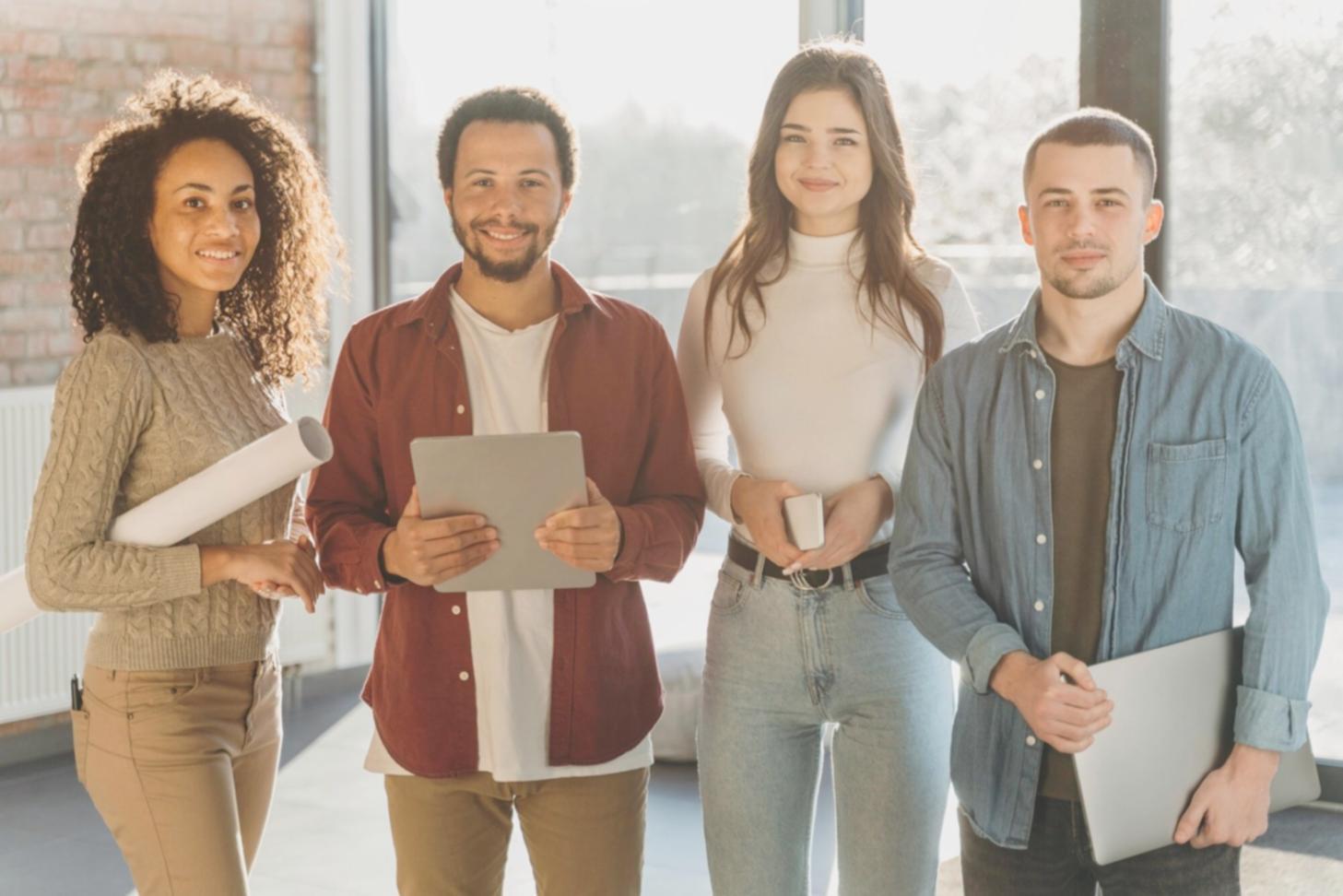 Group of program graduates celebrating completion of budget tracking course